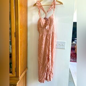 NWT rayon romper by A.U.W.  Junior size XL. Peach with white flowers.